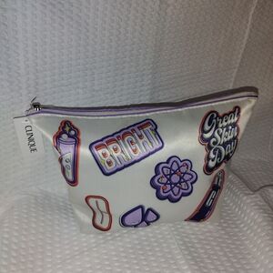 Clinique White Cosmetic Bag with Colorful Patches